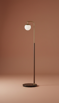 A sophisticated floor lamp showcased in a perfectly centered frame against a neutral Terracotta background. The product is...